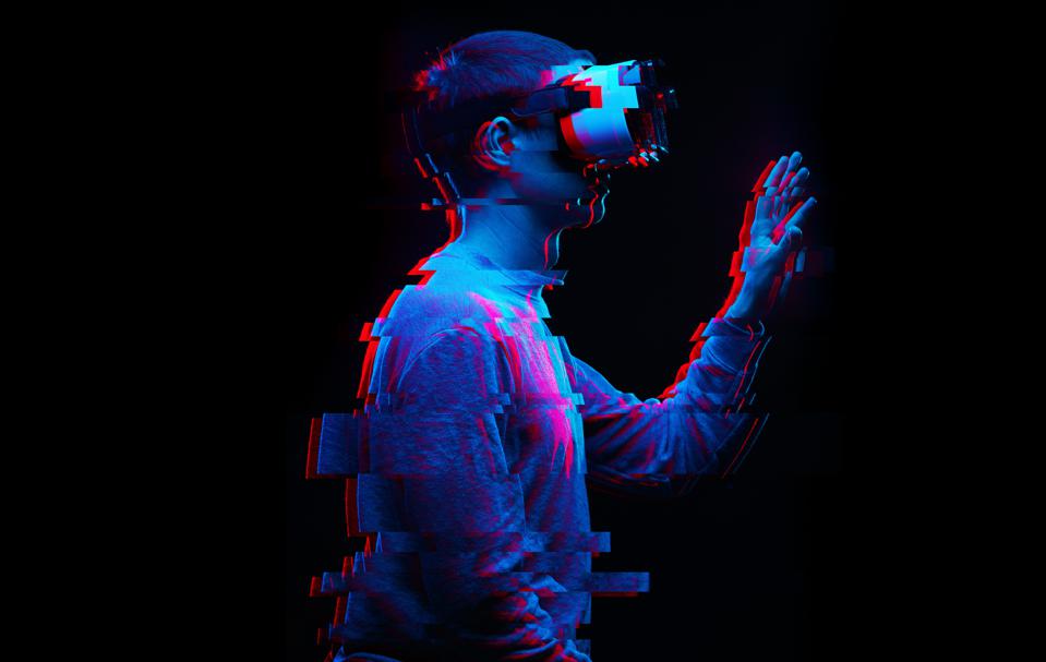 Man in VR headset. Metaverse, Extended, Virtual, Augmented, Mixed, Reality