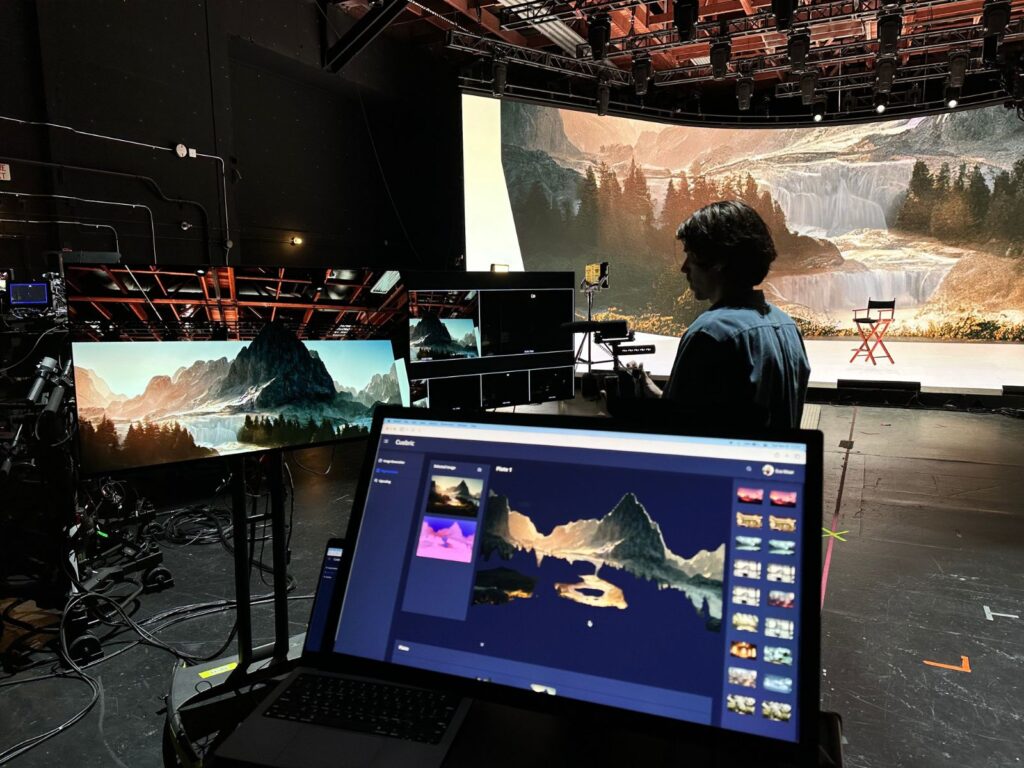 An AI-driven pre-production workflow showing the use of advanced storyboarding and visualisation tools like Midjourney, DALL-E, and Stable Diffusion. The image depicts a film director using a digital tablet to create detailed scene visualisations from text prompts. In the background, a team collaborates on large screens displaying various scene concepts. The AI-powered tools facilitate communication by providing clear visual references, eliminating the need for hand-drawn storyboards, and allowing for quick iterations and updates. The setting represents the fusion of creativity and technology in pre-production, showcasing how AI accelerates the planning process and encourages collaboration